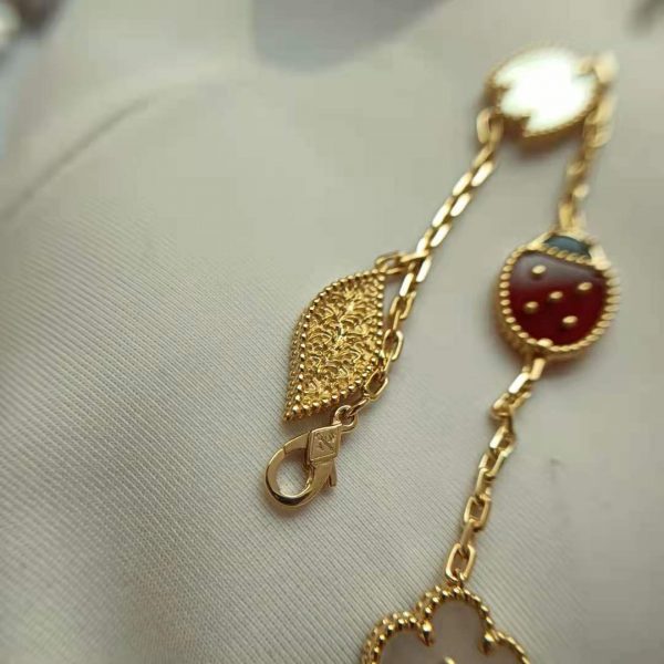Van Cleef Arpels Lucky Spring bracelet, 5 motifs Yellow gold, Carnelian, Mother-of-pearl, Onyx